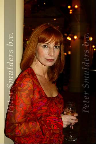 Scheveningen 30 september 2003
Society brunch in het holland casino scheveningen
Marianne Mudder  met glas champagne
