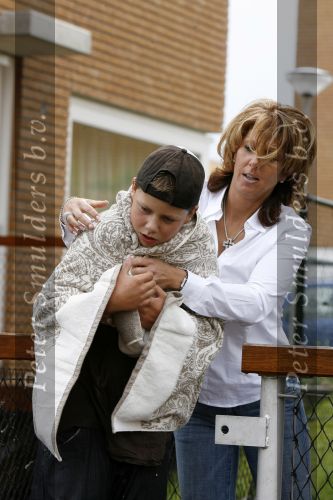 Almere 27 augustus 2006
Rachel Hazes met Andre en Roxanne bij hun nieuwe huis in Almere.