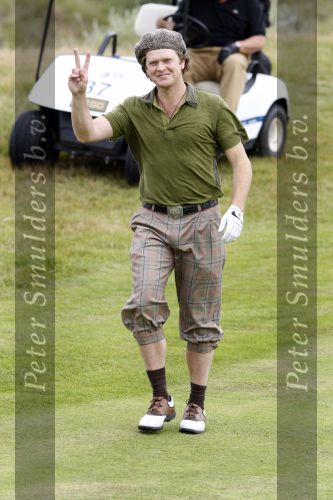Zandvoort 18 augustus 2007
Beau v Erven Dorens met korte broek en pet golfend  tijdens Charity challenge tijdens KLM open.