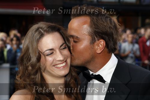Amsterdam 23 augustus 2007
Premiere  film 0att Damon in Tuschinski. Geert Hoes met zijn vriendin Manuela kussend