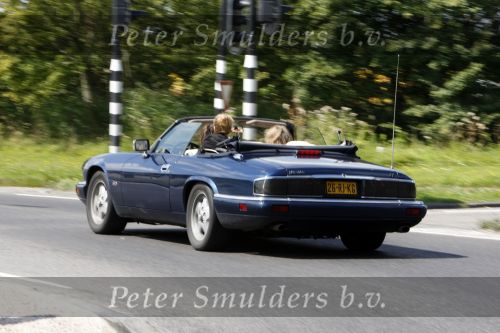 Amsterdam ijmuiden 11 augustus 2007
Mathijs v Nieuwkerk zijn dochter en vrouw gaan met de jaguar cabrio naar het strand in Ijmuiden.