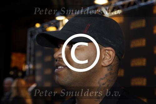 Amsterdam 5 september 2011
Premiere double trouble in tuschinski. rapper Brace met tatoo en vriendin
Peter Smulders bv