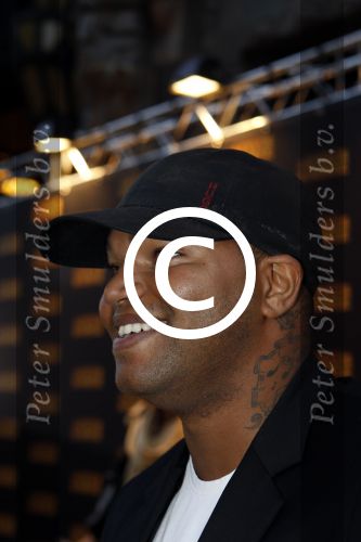Amsterdam 5 september 2011
Premiere double trouble in tuschinski. rapper Brace met tatoo en vriendin
Peter Smulders bv