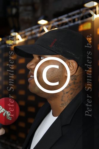 Amsterdam 5 september 2011
Premiere double trouble in tuschinski. rapper Brace met tatoo en vriendin
Peter Smulders bv