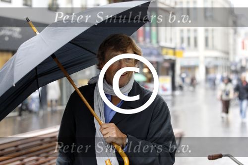 Den Haag 12 september 2011
Ferry Mingele onder paraplu.
Peter Smulders bv
