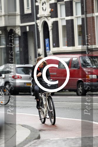 Amsterdam 26 augustus 2011
Lauren Verster in de regen op de fiets.
Peter Smulders bv