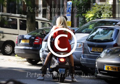 Amsterdam 4 september 2012
Candy Dulfer met vriend Bela op vespa scooter
Peter Smulders bv