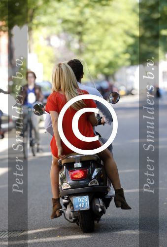 Amsterdam 4 september 2012
Candy Dulfer met vriend Bela op vespa scooter
Peter Smulders bv