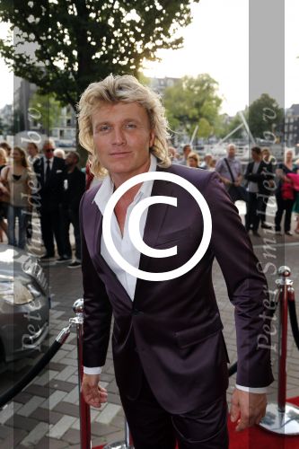 Amsterdam 29 augustus 2012
Premiere Yab Yum in carre. Hans Klok met kennissen
Peter Smulders bv