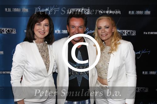 Amsterdam 8 augustus 2013
Gerard Joling en Caren Maywood en Alice Maywood tijdens persconferentie in het Amstel hotel waar ze aankondigen weer op te gaan treden tijdens concert Gerad Joling in het ziggo dome.
Peter Smulders bv