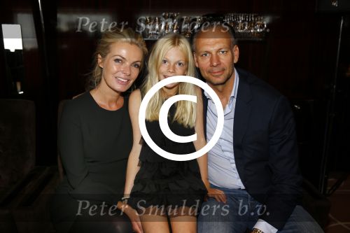 Amsterdam 8 september 2013
Modeshow Paul Schulten in het okura. Bart en Simone v Trojen met dochter