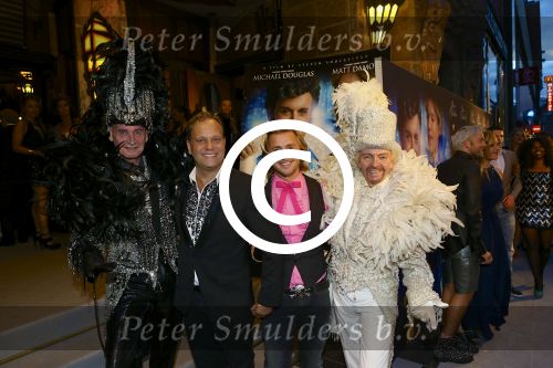AMSTERDAM - Bij het Tuschinski Theater is de premiere van Behind the Candelabra. Met op de rode loper  Carlo Boszhard met partner