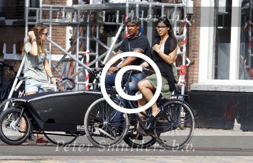 Amsterdam 6 september 2013
Frank Rijkaard met zijn dochter Lindsay op de fiets