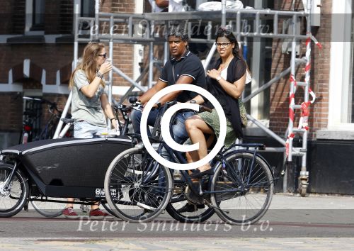 Amsterdam 6 september 2013
Frank Rijkaard met zijn dochter Lindsay op de fiets
