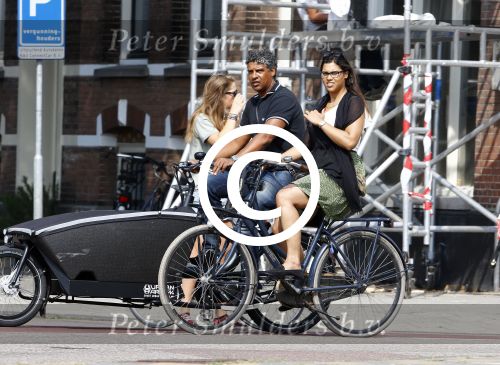 Amsterdam 6 september 2013
Frank Rijkaard met zijn dochter Lindsay op de fiets