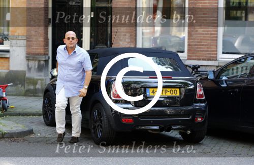 Amsterdam 16 augustus 2013
Jaap v Zweden met zijn vrouw Aaltje in een mini cooper cabrio.
Peter Smulders bv
