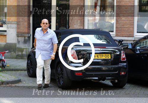 Amsterdam 16 augustus 2013
Jaap v Zweden met zijn vrouw Aaltje in een mini cooper cabrio.
Peter Smulders bv