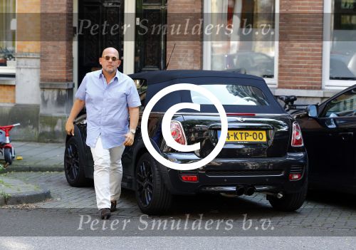 Amsterdam 16 augustus 2013
Jaap v Zweden met zijn vrouw Aaltje in een mini cooper cabrio.
Peter Smulders bv