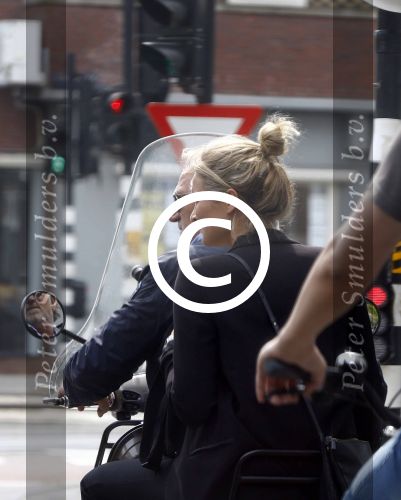 Amsterdam 21 augustus 2013
Lieke v Lexmond samen met haar manager Frank Wisse op vespa scooter.
Peter Smulders bv