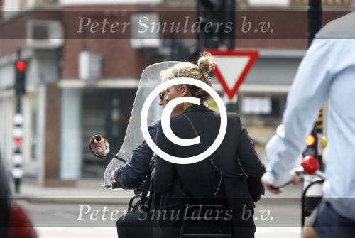 Amsterdam 21 augustus 2013
Lieke v Lexmond samen met haar manager Frank Wisse op vespa scooter.
Peter Smulders bv