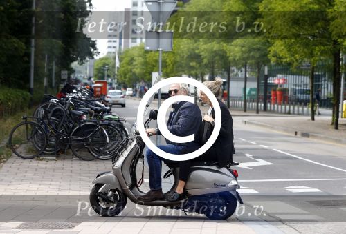 Amsterdam 21 augustus 2013
Lieke v Lexmond samen met haar manager Frank Wisse op vespa scooter.
Peter Smulders bv