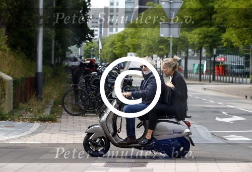 Amsterdam 21 augustus 2013
Lieke v Lexmond samen met haar manager Frank Wisse op vespa scooter.
Peter Smulders bv