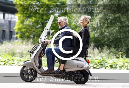 Amsterdam 21 augustus 2013
Lieke v Lexmond samen met haar manager Frank Wisse op vespa scooter.
Peter Smulders bv