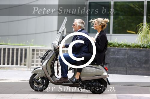 Amsterdam 21 augustus 2013
Lieke v Lexmond samen met haar manager Frank Wisse op vespa scooter.
Peter Smulders bv