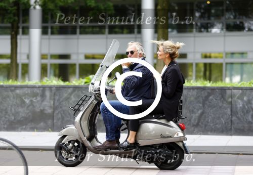 Amsterdam 21 augustus 2013
Lieke v Lexmond samen met haar manager Frank Wisse op vespa scooter.
Peter Smulders bv