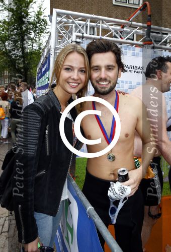 Amsterdam 8 september 2013
Amsterdam city swim door de grachten met diverse bn ers.
Ruud Feltkamp met zijn vriendin