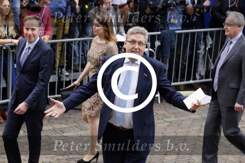 Den Haag 16 september 2014
Prinsjesdag met oa Koning Willem Alexander Koningin Maxima prinses Laurentien en prins Constantijn. Gouden Koets op het binnenhof. Henk Krol met vriend