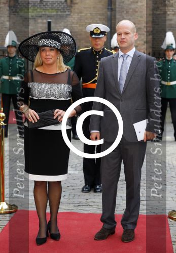Den Haag 16 september 2014
Prinsjesdag met oa Koning Willem Alexander Koningin Maxima prinses Laurentien en prins Constantijn. Gouden Koets op het binnenhof. Jeanine Hennis-Plasschaert  met man