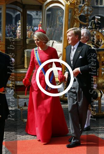 Den Haag 16 september 2014
Prinsjesdag met oa Koning Willem Alexander Koningin Maxima prinses Laurentien en prins Constantijn. Gouden Koets op het binnenhof.