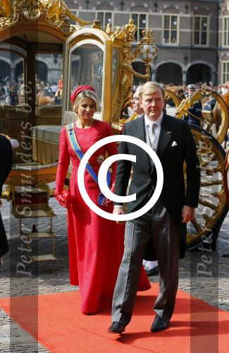Den Haag 16 september 2014
Prinsjesdag met oa Koning Willem Alexander Koningin Maxima prinses Laurentien en prins Constantijn. Gouden Koets op het binnenhof.