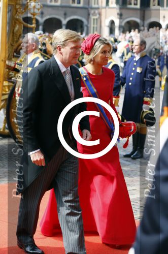 Den Haag 16 september 2014
Prinsjesdag met oa Koning Willem Alexander Koningin Maxima prinses Laurentien en prins Constantijn. Gouden Koets op het binnenhof.
