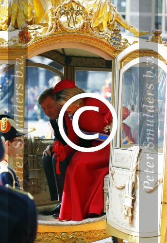 Den Haag 16 september 2014
Prinsjesdag met oa Koning Willem Alexander Koningin Maxima prinses Laurentien en prins Constantijn. Gouden Koets op het binnenhof.