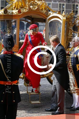 Den Haag 16 september 2014
Prinsjesdag met oa Koning Willem Alexander Koningin Maxima prinses Laurentien en prins Constantijn. Gouden Koets op het binnenhof.