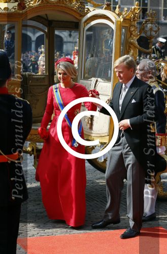 Den Haag 16 september 2014
Prinsjesdag met oa Koning Willem Alexander Koningin Maxima prinses Laurentien en prins Constantijn. Gouden Koets op het binnenhof.