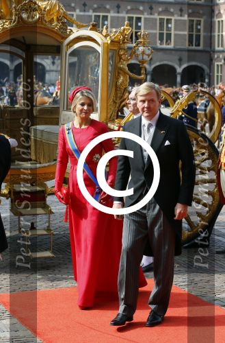 Den Haag 16 september 2014
Prinsjesdag met oa Koning Willem Alexander Koningin Maxima prinses Laurentien en prins Constantijn. Gouden Koets op het binnenhof.