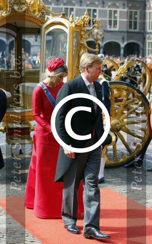 Den Haag 16 september 2014
Prinsjesdag met oa Koning Willem Alexander Koningin Maxima prinses Laurentien en prins Constantijn. Gouden Koets op het binnenhof.