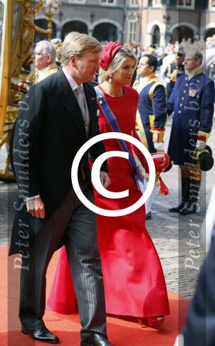 Den Haag 16 september 2014
Prinsjesdag met oa Koning Willem Alexander Koningin Maxima prinses Laurentien en prins Constantijn. Gouden Koets op het binnenhof.