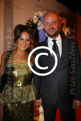 Amsterdam 15 september 2014
Modeshow Addy v d Krommenacker in het IJ theater. Saar Koningsberger met vriend Martijn