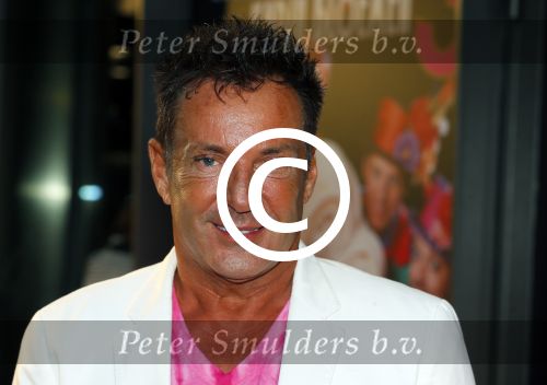 Amsterdam 3 september 2015 
Premiere Stiletto in het nieuwe de la mar.
Gerard Joling met een vriendin