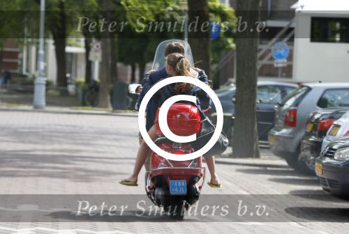 Amsterdam 26 augustus 2015 
Martijn Krabbe met dochter Jasmijn op zijn vespa scooter