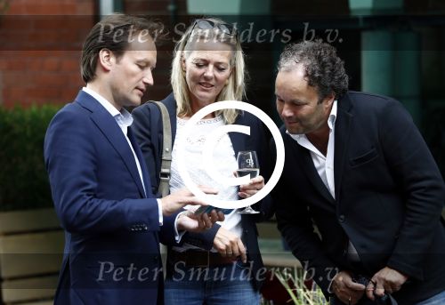 Amsterdam 28 juni 2016 
Presentatie Princess koffers voor het Nederlandse team voor de olympische spelen van Rio de Janeiro. Frank Houben met Dorien Ouborg en Lodewijk Varossiau
