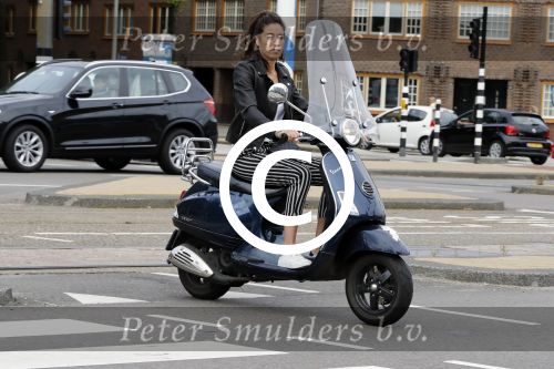 Amsterdam 2 september 2016  
Naomi v As op vespa scooter