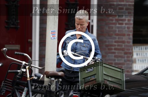 Amsterdam 28 juli 2017
Politieagente Ellie Lust met haar fiets in amsterdam