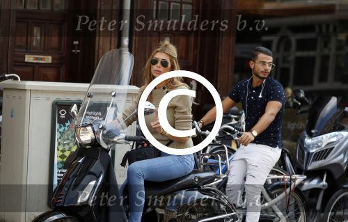 Amsterdam 3 september 2017 
Estelle Cruijff op haar vespa scooter