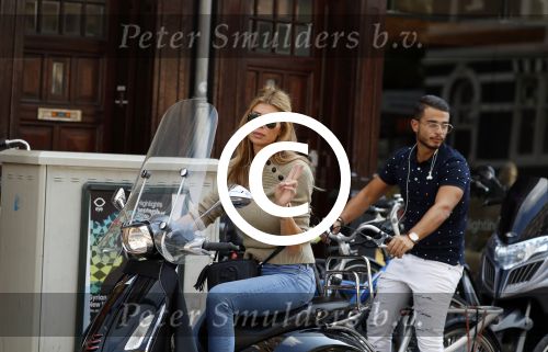 Amsterdam 3 september 2017 
Estelle Cruijff op haar vespa scooter