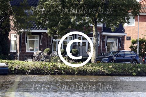 Amsterdam 15 en 17 september 2017
Humberto Tan zijn auto staat voor zijn huis.